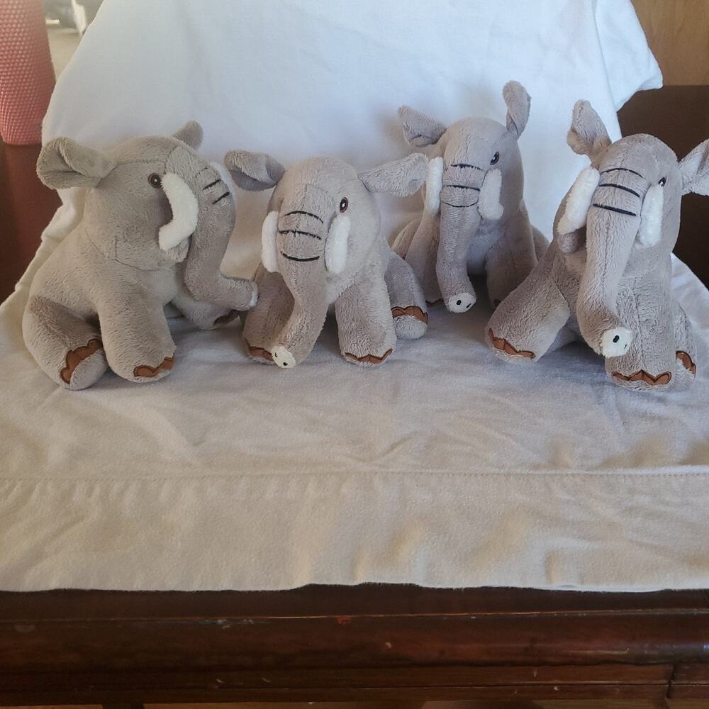 Lot of 4 Curto Elephant plush